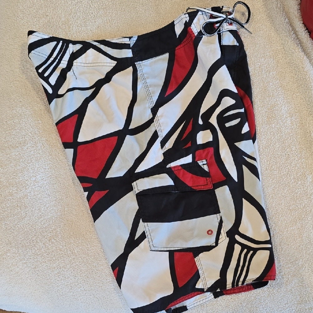 O'Neill Black and Red Board Shorts with Geometric Design - Picture 3 of 4